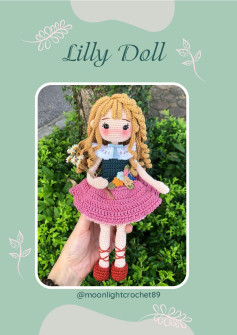 lily doll, Blonde girl doll crochet pattern wearing pink dress.