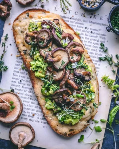 Avo toast with mushrooms and vegan cheese