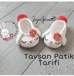 Beyaz tavşan ayakkabıları için tığ işi modeli.