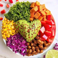 Big heart salad bowl with roasted chickpeas