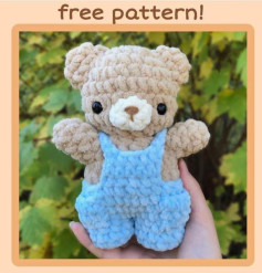 brown bear wearing overalls