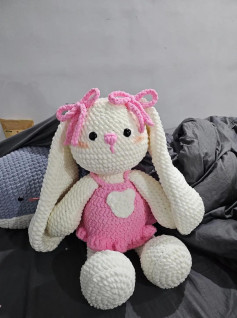 Crochet pattern for a rabbit wearing a pink dress