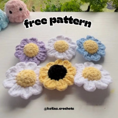 Crochet pattern for flower with purple petals and yellow pistil