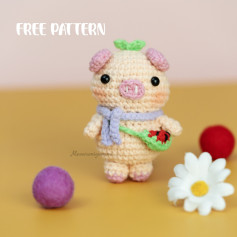 Crochet pig wearing cotyledon leaves