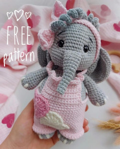 Gray elephant crochet pattern wearing pink dress