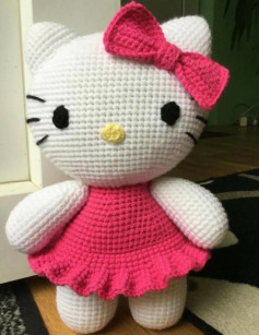 Hello kitty crochet pattern wearing a pink dress