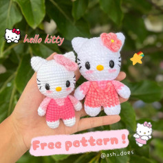 hello kitty free pattern, crochet pattern of kitty cat wearing pink dress and pink bow.