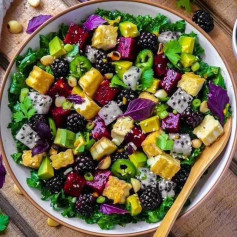 KALE AND TROPICAL FRUIT SALAD WITH PAN FRIED TOFU AND CITRUS VINAIGRETTE