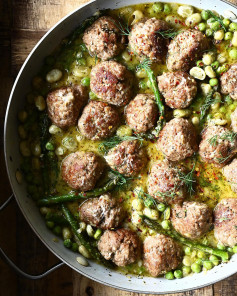 Meatballs primavera - Tender meatballs simmered in a Parmesan butter sauce brightened up with lemon juice and packed with delicious veggies! It’s fragrant, bright and so comforting. A crowd pleaser!