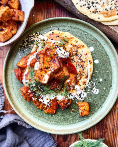 One of my favourite layered dishes for you - Harissa tomatoes, crispy soy tofu, gram flour flatbread, yogurt and salty seeds!