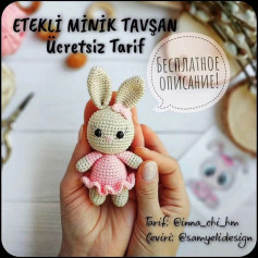 Pembe elbise ve fiyonk giyen bir tavşan için tığ işi modeli