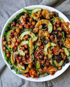 Salad bowl with Miso Tahini Dressing .