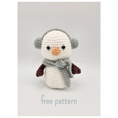 Snowman crochet pattern wearing headphones