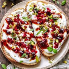 Sourdough Toasts with Whipped Lemon Feta, Pistachios, Pomegranate Seeds and Maple Fig Balsamic Drizzle! 💕They’re the perfect mix of crunchy, creamy, salty, sour and sweet!