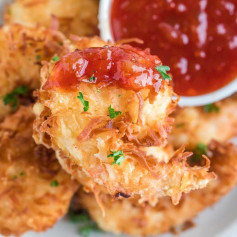 Coconut shrimp are crispy, golden, and slightly sweet. This easy finger food is perfect for any party and completely irresistible when served with my 3-ingredient dipping sauce.⁠