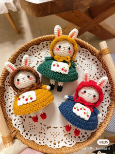 crochet rabbit wearing dress and hood