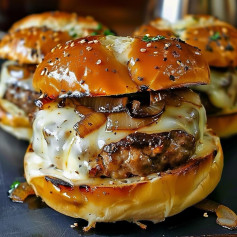 Burgers Transform your burger game with these juicy burgers with caramelized onions and melted cheese