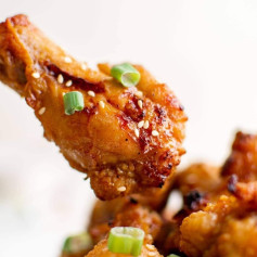 Honey Garlic Chicken Drumettes are baked instead of fried and tossed in a sweet honey garlic sauce