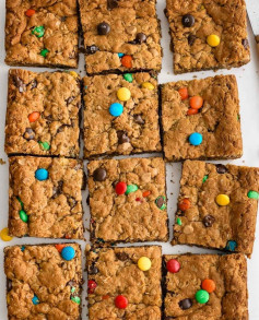 Monster Cookie Bars are soft and chewy peanut butter-oat bars loaded with M&M’s