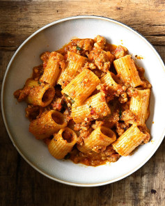 Pasta with spicy sun-dried tomato pesto and Italian sausage