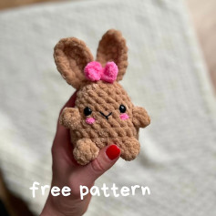 Crochet brown rabbit with pink bow