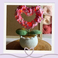 Corazón de flores tejido a crochet con luces LED decorativas