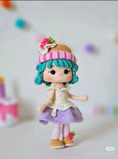Crochet Pattern for a Colorful Doll with Hat and Skirt