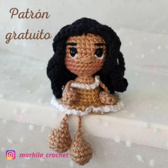 Patrón de muñeca amigurumi de pelo negro con vestido marrón