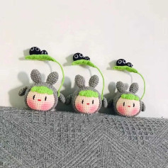 Three Cute Crochet Characters with Leaves and Eyes