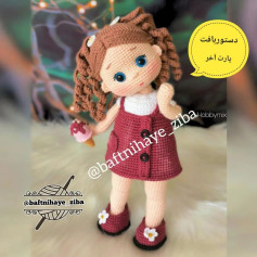 الگوی عروسک بافتنی دختر بچه با لباس قرمز