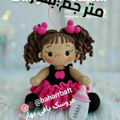 الگوی بافتنی عروسک دختر بچه با پیراهن صورتی