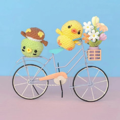 Crochet Animal Friends Enjoying a Bicycle Ride with Flowers
