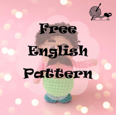 Cute Crochet Doll with Bright Green Overalls and Mustache