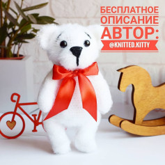 Изящная схема вязания белого мишки с красной лентой