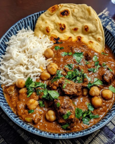 Creamy Coconut Beef & Chickpea Curry Served with Buttery Garlic Naan