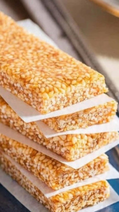 Heres a detailed recipe for Greek Sesame Candy with Honey (Pasteli