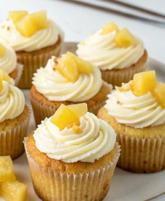 Tropical Filled Pineapple Cupcakes – Stuffed with sunshine, topped with creaminess