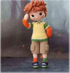 Crochet Pattern for Adorable Boy Doll with Colorful Outfit