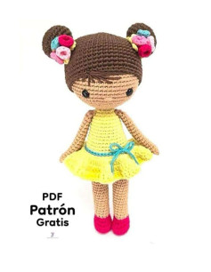 Muñeca Amigurumi con Vestido Amarillo y Flores en el Pelo