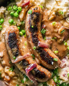 Savory Sausages with Cheddar Mash and Onion Gravy Delight