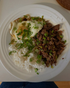 Sizzling Bulgogi Beef Bowl with Fried Egg and Scallions