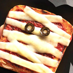 Spooky Hand-Shaped Halloween Pizzas