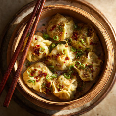 Sweet & Sour Veggie Dumplings with Spicy Chili Broth
