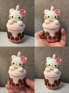 Amigurumi de gato fofo em copo de chá bolha rosa