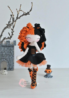 Halloween-Themed Crochet Doll with Orange and Black Outfit