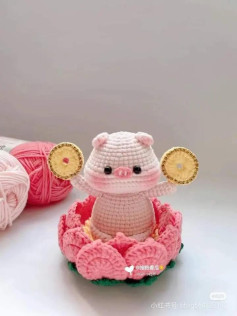 Amigurumi Pig in a Lotus Flower with Gold Coins