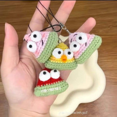 Bộ sưu tập móc len hình tam giác mắt to đầy màu sắc