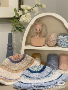 Colorful Crochet Bucket Hats in Cozy Home Setting