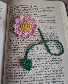 Crochet Flower Bookmark Lying on an Open Book Page