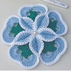 Crochet Flower Pattern with Blue and White Petals